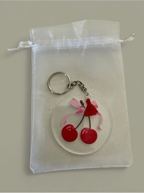 Cherry Graphic Acrylic Keychain with Pink Bow and Red Tassel